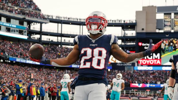 Running back James White celebrates a touchdown against the Miami Dolphins (Credit: Winslow Townson-USA TODAY Sports)